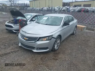 2014 Chevrolet Impala LT with VIN 1G1125S34EU123487, listed as a IAAI auction lot 42088001 with 184,553 mi miles and . Bid and sale history available at DreamBid. Image 17.