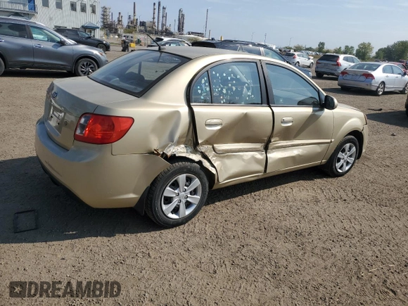 2011 Kia Rio with VIN KNADH4B38B6725531, listed as a Copart auction lot 72389974 with 124,315 mi miles and Salvage Title. Bid and sale history available at DreamBid. Image 3.