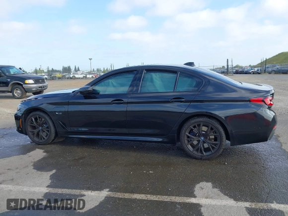 2023 BMW 5 Series 530e with VIN WBA13AG09PCL56556, listed as a IAAI auction lot 42098427 with Not provided miles and . Bid and sale history available at DreamBid. Image 14.