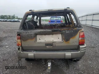 1998 Jeep Grand Cherokee Limited z VIN 1J4GZ88ZXWC255195, wystawiony jako Copart lot #55817705 z przebiegiem Nie podano mil oraz Nie do naprawy • Non repairable. Historia ofert i sprzedaży dostępna na DreamBid. Obrazek 6.