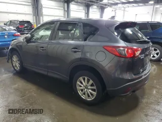 2016 Mazda CX-5 Touring z VIN JM3KE4CY5G0852073, wystawiony jako Copart lot #56599055 z przebiegiem 72 167 mil mil oraz Szkoda całkowita • Salvage title. Historia ofert i sprzedaży dostępna na DreamBid. Obrazek 2.