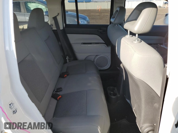 2007 Jeep Patriot Sport with VIN 1J8FF28WX7D355881, listed as a Copart auction lot 82766473 with 120,519 mi miles and Salvage Title. Bid and sale history available at DreamBid. Image 11.