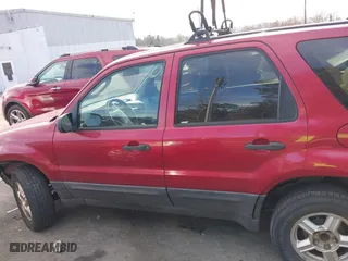 2006 Ford Escape XLT with VIN 1FMYU03116KC42851, listed as a IAAI auction lot 41667519 with 257,502 mi miles. Bid and sale history available at carsss.com. Image 14.