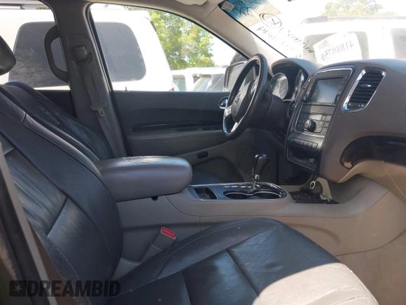 2012 Dodge Durango Crew with VIN 1C4RDHDG9CC330644, listed as a IAAI auction lot 41889758 with 194,295 mi miles and . Bid and sale history available at DreamBid. Image 5.