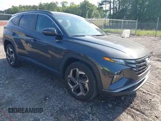 2022 Hyundai Tucson SEL z VIN 5NMJF3AEXNH001548, wystawiony jako IAAI lot #42148549 z przebiegiem 32 613 mil mil oraz . Historia ofert i sprzedaży dostępna na DreamBid. Obrazek 1.