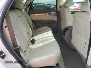 2021 Cadillac XT5 FWD Premium Luxury with VIN 1GYKNCRS0MZ110560, listed as a Copart auction lot 52779575 with 44,559 mi miles and Salvage title. Bid and sale history available at DreamBid. Image 11.