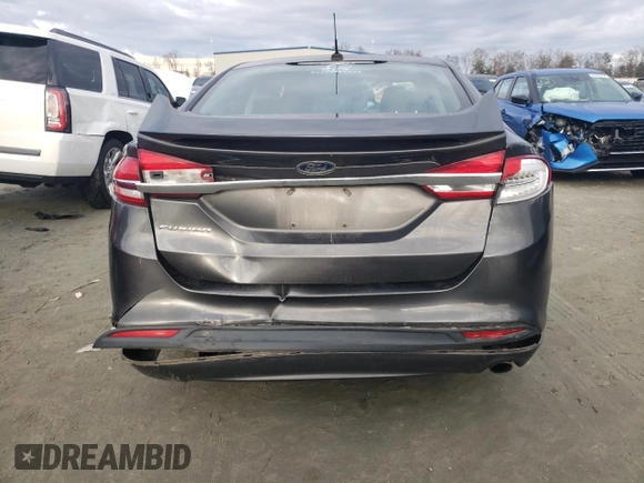 2018 Ford Fusion S z VIN 3FA6P0G70JR264965, wystawiony jako Copart lot #85553684 z przebiegiem 235 205 mil mil oraz Szkoda całkowita • Salvage title. Historia ofert i sprzedaży dostępna na DreamBid. Obrazek 6.