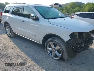 2013 Dodge Durango Citadel z VIN 1C4SDJET6DC652552, wystawiony jako IAAI lot #42602746 z przebiegiem 163 602 mil mil oraz . Historia ofert i sprzedaży dostępna na DreamBid. Obrazek 1.