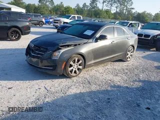 2015 Cadillac ATS Sedan Luxury RWD with VIN 1G6AB5RX4F0122156, listed as a IAAI auction lot 42012891 with 137,879 mi miles. Bid and sale history available at carsss.com. Image 17.