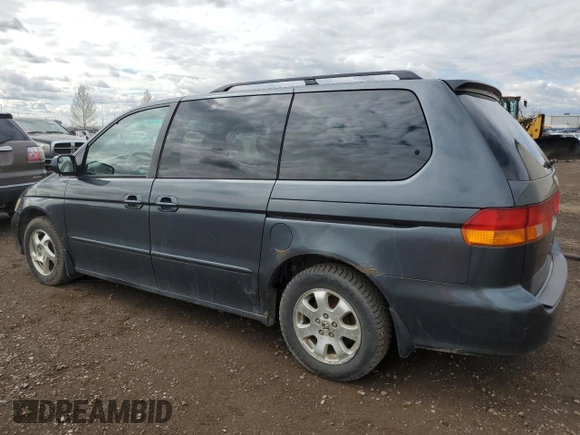2003 Honda Odyssey EX with VIN 2HKRL18603H008412, listed as a Copart auction lot 55310905 with 352,774 mi miles and Salvage Title. Bid and sale history available at DreamBid. Image 2.