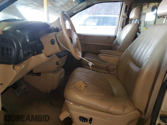 1998 Dodge Caravan LE with VIN 1B4GP54LXWB743058, listed as a Copart auction lot 80271164 with 192,048 mi miles and Salvage title. Bid and sale history available at DreamBid. Image 7.