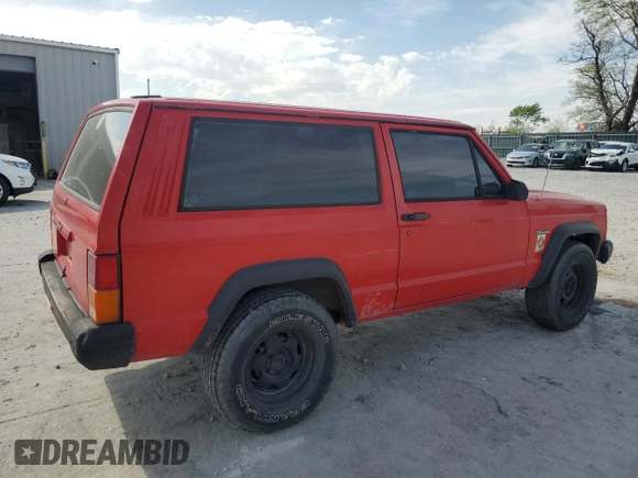 1995 Jeep Cherokee SE with VIN 1J4FT27P9SL561969, listed as a Copart auction lot 53295865 with 151,377 mi miles and Salvage title. Bid and sale history available at DreamBid. Image 3.