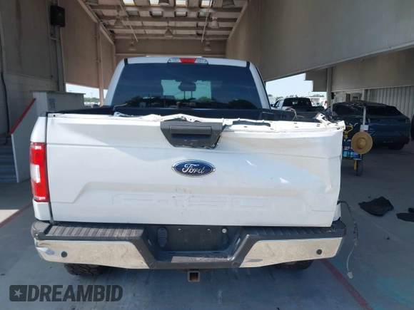 2019 Ford F-150 XL with VIN 1FTEW1E55KFB69767, listed as a IAAI auction lot 42326370 with 143,523 mi miles and . Bid and sale history available at DreamBid. Image 16.