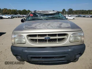 2000 Ford Explorer Sport with VIN 1FMYU60E3YUA95157, listed as a Copart auction lot 77214804 with 322,604 mi miles and Salvage title. Bid and sale history available at DreamBid. Image 5.