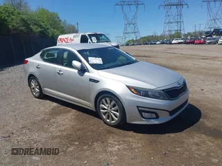 2014 Kia Optima LX with VIN 5XXGM4A72EG339998, listed as a IAAI auction lot 42132720 with 186,989 mi miles. Bid and sale history available at carsss.com. Image 1.