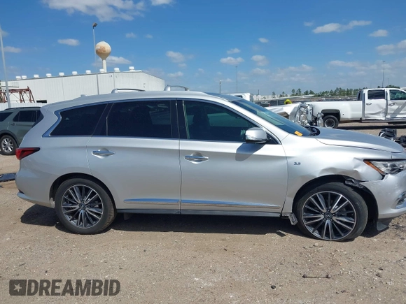 2019 Infiniti QX60 LUXE with VIN 5N1DL0MN8KC526839, listed as a IAAI auction lot 41811271 with 83,729 mi miles. Bid and sale history available at carsss.com. Image 13.