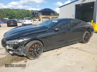 2020 BMW 8 Series M850i z VIN WBAGV8C08LCD46679, wystawiony jako Copart lot #56163785 z przebiegiem Nie podano mil oraz Czysty tytuł • Clean title. Historia ofert i sprzedaży dostępna na DreamBid. Obrazek 1.