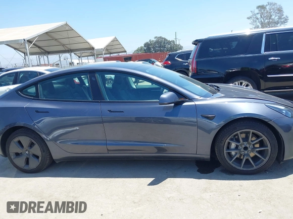2023 Tesla Model 3 with VIN 5YJ3E1EA1PF545402, listed as a IAAI auction lot 42671354 with 37,948 mi miles and . Bid and sale history available at DreamBid. Image 14.