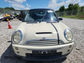 2006 MINI Hardtop S with VIN WMWRE33556TJ38543, listed as a Copart auction lot 62420145 with 105,656 mi miles and Salvage title. Bid and sale history available at DreamBid. Image 5.