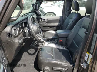 2019 Jeep Wrangler Unlimited Sahara with VIN 1C4HJXENXKW521630, listed as a Copart auction lot 56196145 with 56,753 mi miles and Salvage title. Bid and sale history available at DreamBid. Image 7.