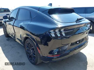 2023 Ford Mustang Mach-E GT z VIN 3FMTK4SX5PMA06095, wystawiony jako IAAI lot #42203596 z przebiegiem 27 664 mil mil oraz . Historia ofert i sprzedaży dostępna na DreamBid. Obrazek 3.