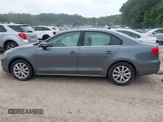 2014 Volkswagen Jetta SE with VIN 3VWD07AJ2EM209176, listed as a IAAI auction lot 42460383 with 172,550 mi miles and . Bid and sale history available at DreamBid. Image 14.