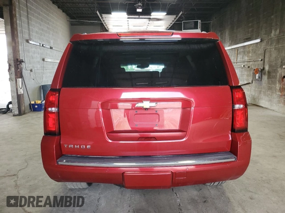 2015 Chevrolet Tahoe LTZ z VIN 1GNSKCKC4FR277564, wystawiony jako Copart lot #60589335 z przebiegiem Nie podano mil oraz Szkoda całkowita • Salvage title. Historia ofert i sprzedaży dostępna na DreamBid. Obrazek 6.