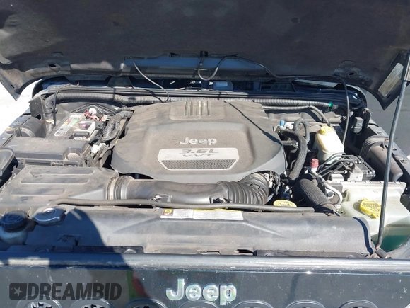 2012 Jeep Wrangler Arctic with VIN 1C4AJWBG7CL170079, listed as a IAAI auction lot 41004260 with 83,408 mi miles and . Bid and sale history available at DreamBid. Image 10.