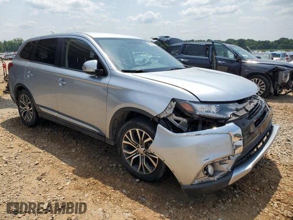 2016 Mitsubishi Outlander SE with VIN JA4AD3A36GZ013709, listed as a Copart auction lot 60262595 with 156,109 mi miles and Salvage title. Bid and sale history available at DreamBid. Image 4.