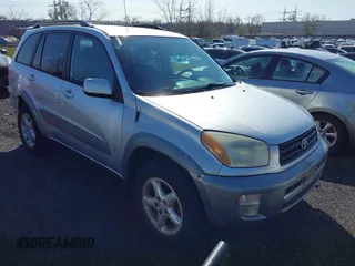 2001 Toyota RAV4 with VIN JTEHH20V310049158, listed as a IAAI auction lot 41934127 with 157,763 mi miles and . Bid and sale history available at DreamBid. Image 1.