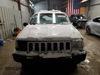 1995 Jeep Grand Cherokee Laredo with VIN 1J4GZ58S6SC630947, listed as a Copart auction lot 82143564 with 267,946 mi miles and Salvage Title. Bid and sale history available at carsss.com. Image 5.