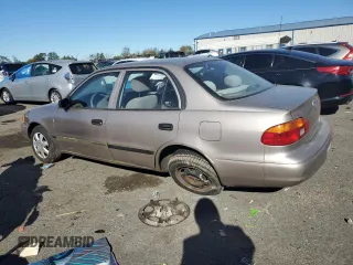 1998 Chevrolet Prizm z VIN 1Y1SK5289WZ434033, wystawiony jako Copart lot #54037694 z przebiegiem 76 601 mil mil oraz Szkody całkowita. Historia ofert i sprzedaży dostępna na DreamBid. Obrazek 3.