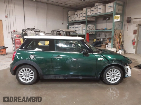 2015 MINI Hardtop S z VIN WMWXP7C57F2A39384, wystawiony jako IAAI lot #41733215 z przebiegiem 60 750 mil mil oraz . Historia ofert i sprzedaży dostępna na DreamBid. Obrazek 14.