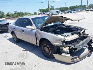 1995 Toyota Camry LE z VIN 4T1SK12E8SU872841, wystawiony jako IAAI lot #42025861 z przebiegiem 228 747 mil mil oraz . Historia ofert i sprzedaży dostępna na DreamBid. Obrazek 1.