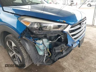 2018 Hyundai Tucson Sport with VIN KM8J33AL0JU803368, listed as a IAAI auction lot 41937235 with 64,163 mi miles and . Bid and sale history available at DreamBid. Image 6.