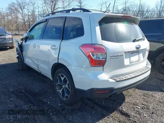 2014 Subaru Forester XT Touring with VIN JF2SJGMC4EH534647, listed as a IAAI auction lot 41828950 with 106,375 mi miles and . Bid and sale history available at DreamBid. Image 3.