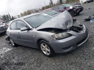 2005 Mazda 3 i with VIN JM1BK12F551282146, listed as a IAAI auction lot 41980284 with 220,345 mi miles and . Bid and sale history available at DreamBid. Image 1.