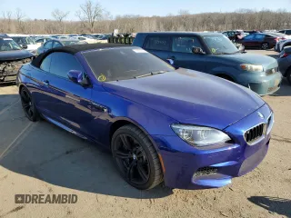 2015 BMW M6 z VIN WBSLZ9C55FD651441, wystawiony jako Copart lot #78511203 z przebiegiem 45 569 mil mil oraz Czysty tytuł • Clean title. Historia ofert i sprzedaży dostępna na DreamBid. Obrazek 4.