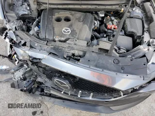 2019 Mazda CX-5 Grand Touring with VIN JM3KFBDM9K0676795, listed as a Copart auction lot 52129885 with 71,869 mi miles and Salvage Title. Bid and sale history available at carsss.com. Image 12.
