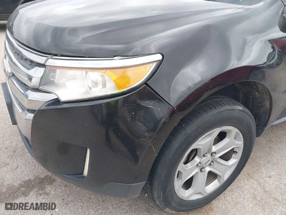 2014 Ford Edge SEL with VIN 2FMDK3JC6EBB61573, listed as a IAAI auction lot 41940539 with 203,438 mi miles. Bid and sale history available at carsss.com. Image 6.