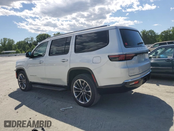 2023 Jeep Wagoneer Series II Carbide with VIN 1C4SJVBP1PS561660, listed as a Copart auction lot 57832565 with 17,715 mi miles and Salvage title. Bid and sale history available at DreamBid. Image 2.