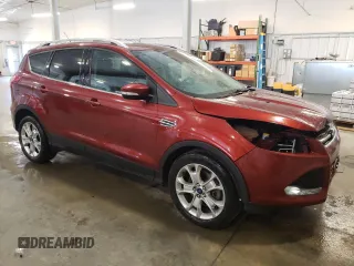 2016 Ford Escape Titanium with VIN 1FMCU9J97GUA67485, listed as a Copart auction lot 57623135 with 95,147 mi miles and Salvage title. Bid and sale history available at DreamBid. Image 4.