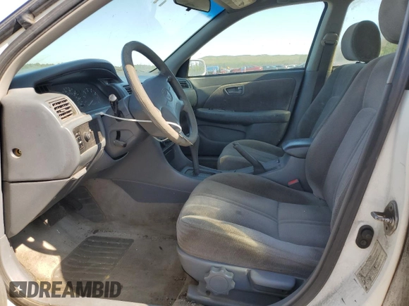 1999 Toyota Camry LE z VIN 4T1BG22K7XU440181, wystawiony jako Copart lot #59304385 z przebiegiem 113 864 mil mil oraz Czysty tytuł • Clean title. Historia ofert i sprzedaży dostępna na DreamBid. Obrazek 7.