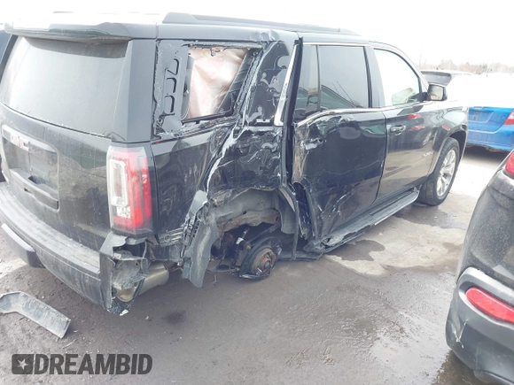 2016 GMC Yukon SLE with VIN 1GKS2AKC3GR398556, listed as a IAAI auction lot 41585972 with 130,961 mi miles. Bid and sale history available at carsss.com. Image 6.