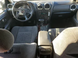 2007 GMC Envoy SLE with VIN 1GKDT13SX72142175, listed as a Copart auction lot 45945305 with 169,048 mi miles and Salvage Title. Bid and sale history available at carsss.com. Image 8.