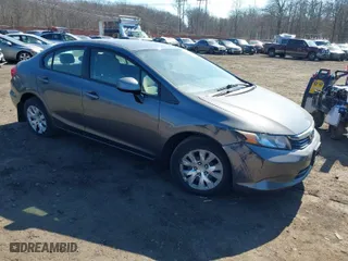 2012 Honda Civic Sdn LX with VIN 19XFB2F52CE329264, listed as a IAAI auction lot 41654894 with 110,836 mi miles. Bid and sale history available at carsss.com. Image 1.
