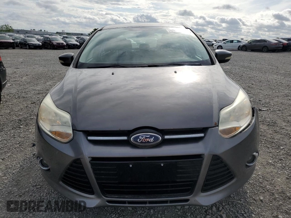 2012 Ford Focus SE with VIN 1FAHP3F27CL335046, listed as a Copart auction lot 55235175 with 128,119 mi miles and Salvage title. Bid and sale history available at DreamBid. Image 5.
