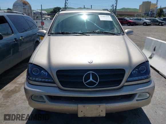 2002 Mercedes-Benz M 320/430/500 z VIN 4JGAB54E52A298975, wystawiony jako IAAI lot #41985135 z przebiegiem 278 592 mil mil oraz . Historia ofert i sprzedaży dostępna na DreamBid. Obrazek 6.