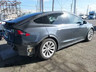 2016 Tesla Model X 70D with VIN 5YJXCBE2XGF006279, listed as a IAAI auction lot 41712973 with 88,398 mi miles and . Bid and sale history available at DreamBid. Image 4.