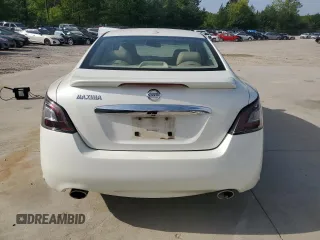 2014 Nissan Maxima SV z VIN 1N4AA5AP4EC446058, wystawiony jako Copart lot #51843385 z przebiegiem 98 481 mil mil oraz Szkoda całkowita • Salvage title. Historia ofert i sprzedaży dostępna na DreamBid. Obrazek 6.